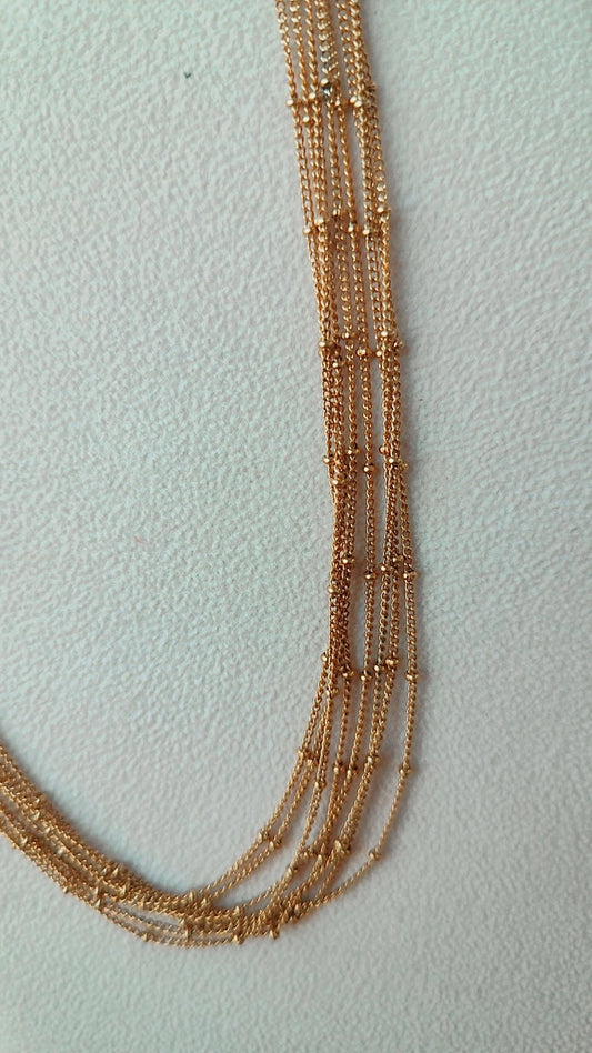 Collar acero dorado